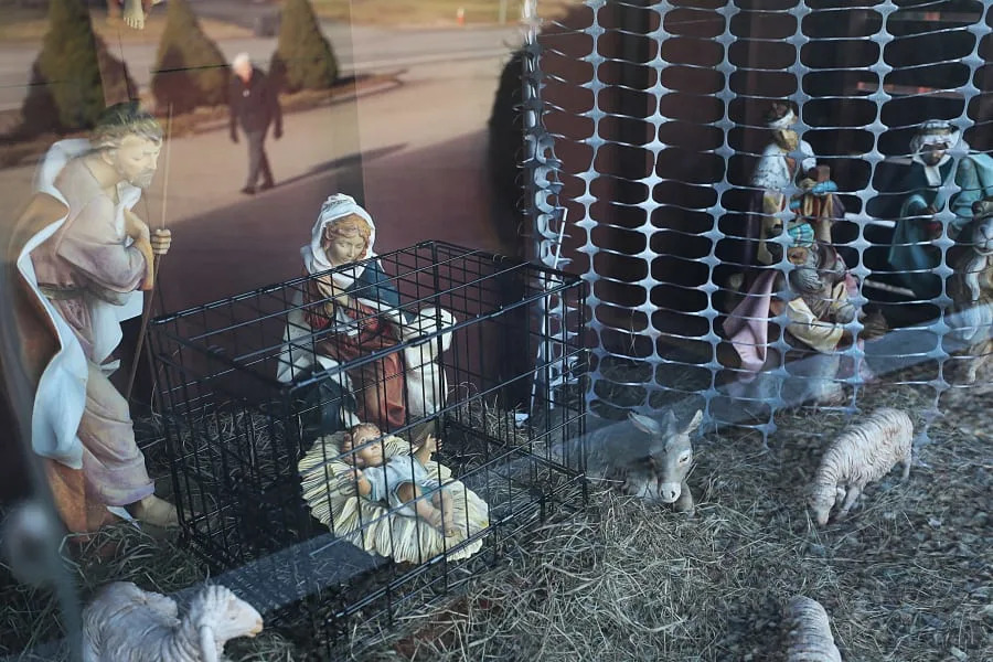 Boston Parish’s Anti‑ICE Nativity — ‘I.C.E. WAS HERE’ Sign Reignites Debate Over Faith and Immigration - Image 1