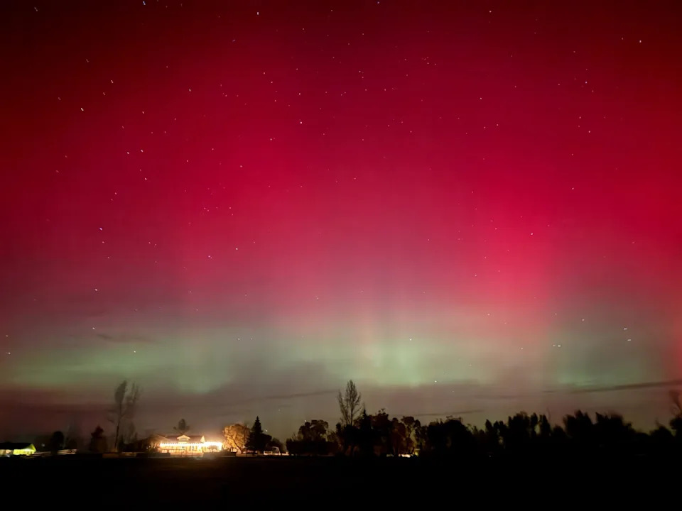 Sled Dogs Race Beneath a Vivid Aurora and Supermoon Over Fairbanks, Alaska - Image 2