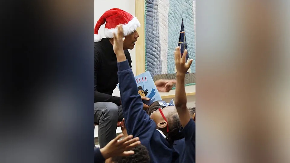 Obama Surprises Chicago Students in Santa Hat, Reads Story at Bessie Coleman Library — Previews New Obama Center Branch - Image 1