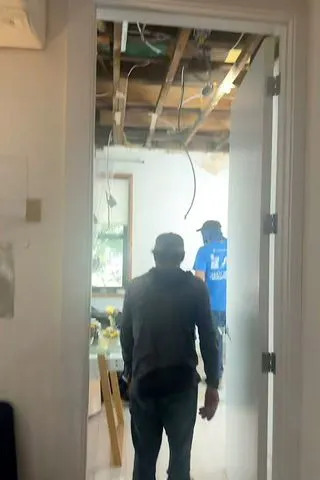 Small Ceiling Crack Escalates to Danger: NYC Intern's Ceiling Collapses After 'Chilling' Grumble - Image 3