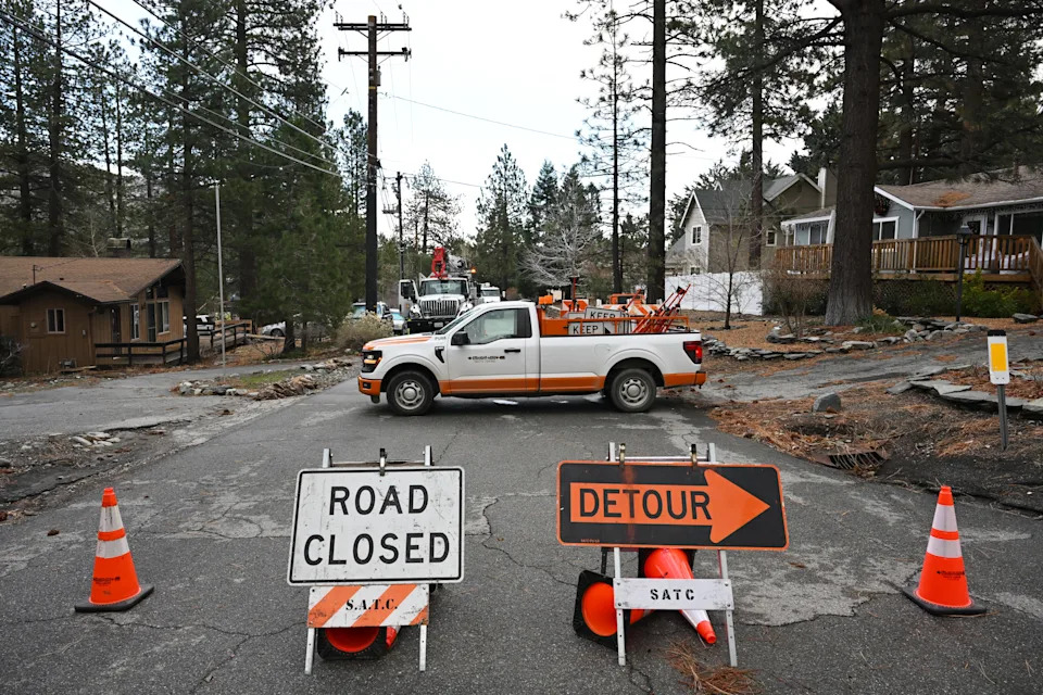 Photos: Christmas-Week Atmospheric Rivers Bury California Homes in Mud, Crack Highways