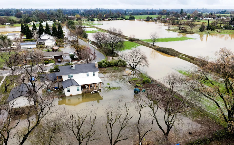 Photos: Christmas-Week Atmospheric Rivers Bury California Homes in Mud, Crack Highways
