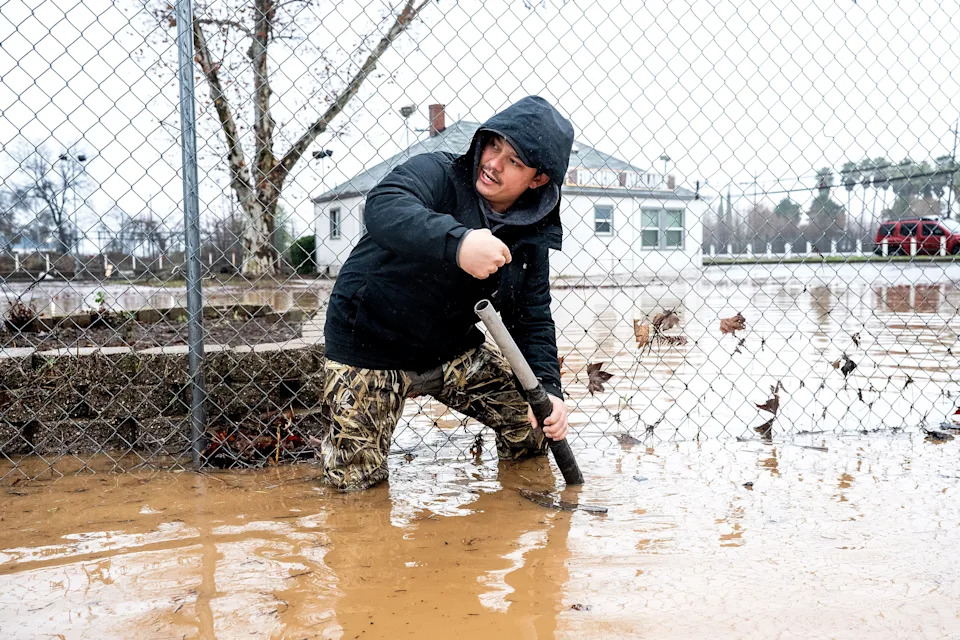 Photos: Christmas-Week Atmospheric Rivers Bury California Homes in Mud, Crack Highways