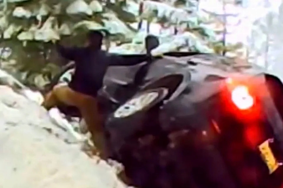 Strangers Form Human Chain to Save Couple and Two Dogs as SUV Hangs Off Icy Highway Ledge on Christmas