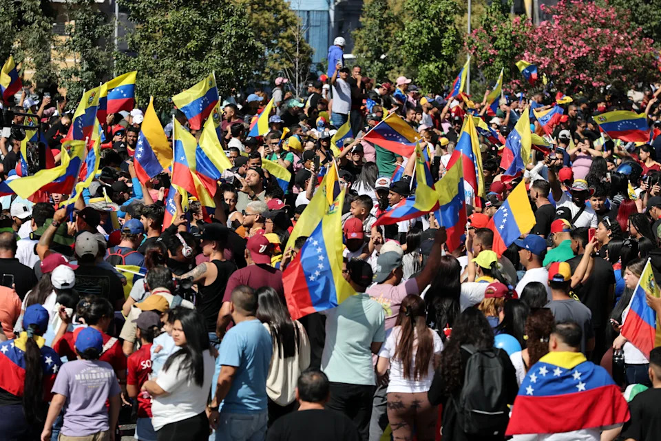 Venezuelan Exiles Celebrate After Reported U.S.-Backed Removal of Maduro, But Anxiety Persists
