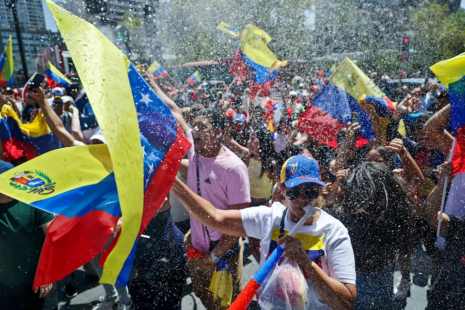 Venezuelan Exiles Celebrate After Reported U.S.-Backed Removal of Maduro, But Anxiety Persists