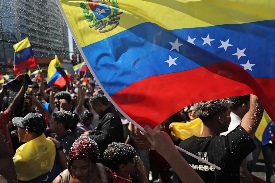 Venezuelan Exiles Celebrate After Reported U.S.-Backed Removal of Maduro, But Anxiety Persists