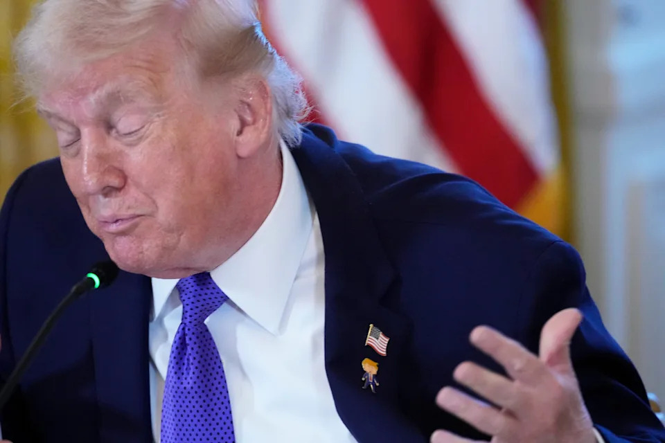 Trump Wears 'Happy Trump' Lapel Pin, Jokes He’s 'Never Happy'