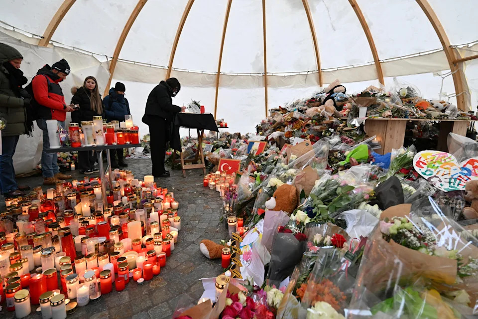 Swiss Bar Co-Owner Detained After Deadly New Year Blaze as Nation Mourns 40 Victims