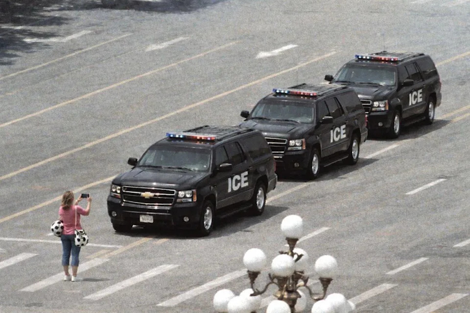 Fact Check: Viral Photo Of Woman Blocking ICE SUVs Is A Digital Edit Of 1989 