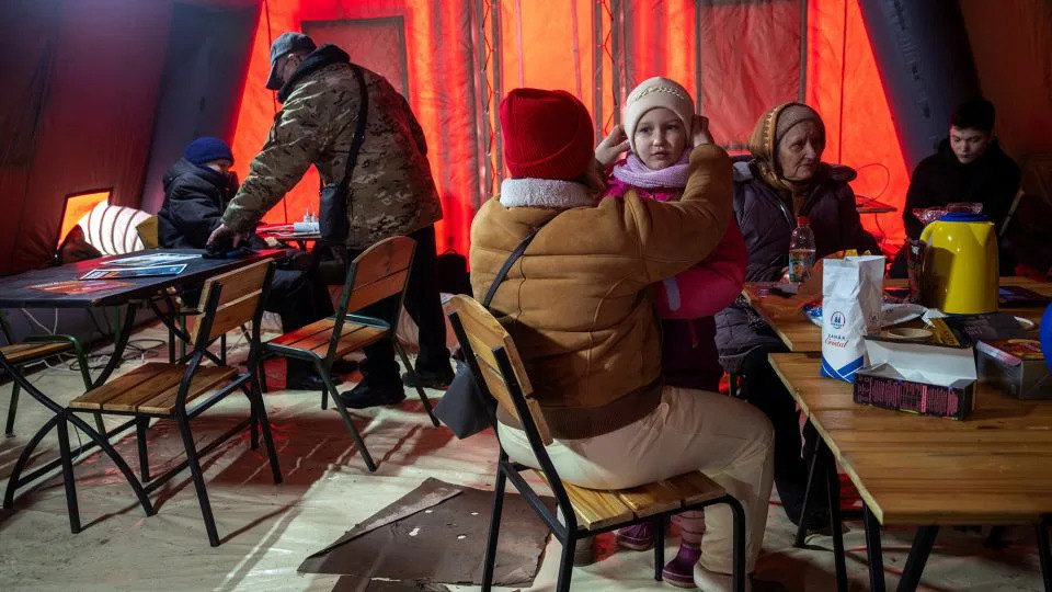 Bonfires, Dancing and Pets: How Ukrainians Are Keeping Warm After Attacks on the Power Grid