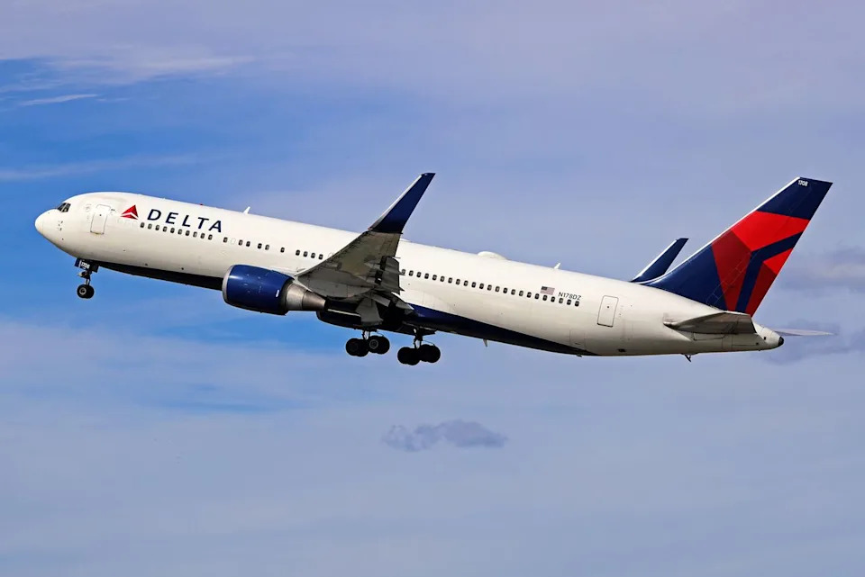 Delta Flight Attendants Allegedly Used Beverage Carts to Block Unruly Passenger — Flight Diverts to Anchorage