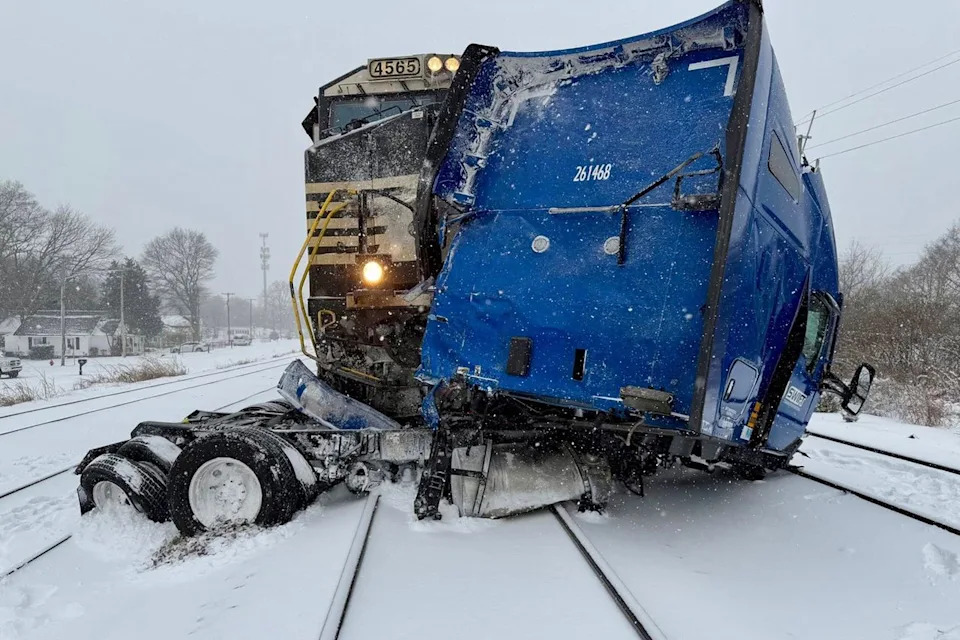 Truck Driver Jumps Clear Seconds Before Train T-Bones Semi During Fierce North Carolina Snowstorm