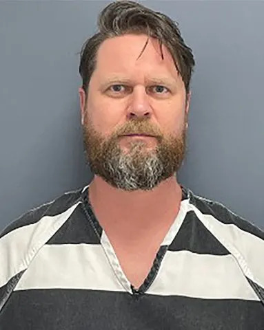 Aurora Man Charged After Ex‑Wife Found Fatally Stabbed Following Garage Chase