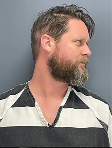 Aurora Man Charged After Ex‑Wife Found Fatally Stabbed Following Garage Chase