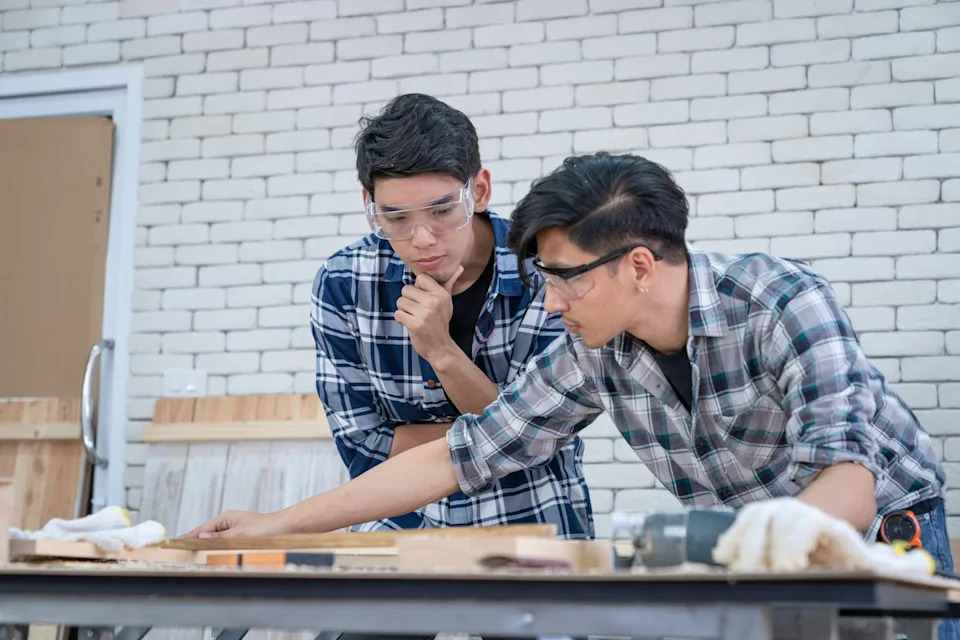 Expertise Over Force: Why Humans Build Prestige-Based Hierarchies