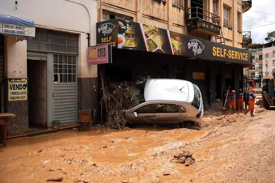 Dozens Of Coffins Swept Away As Flash Floods In Southeast Brazil Push Death Toll To 54