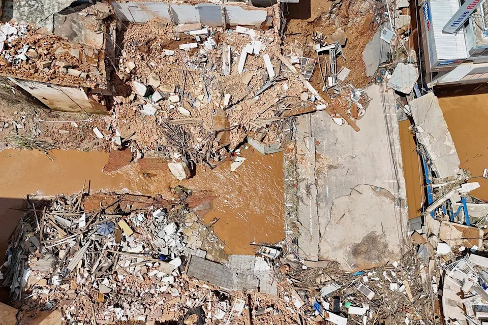 Dozens Of Coffins Swept Away As Flash Floods In Southeast Brazil Push Death Toll To 54