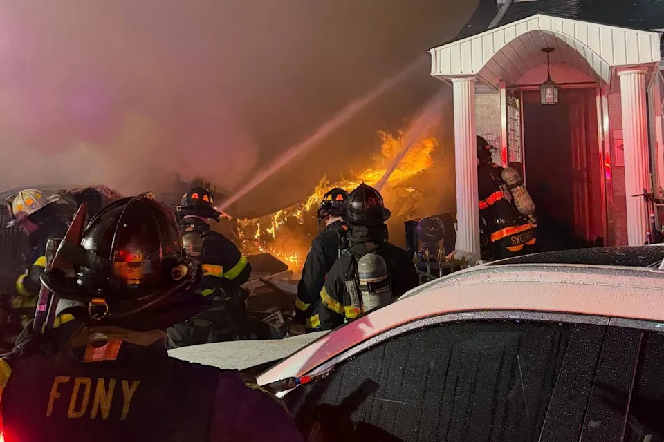 Queens House Explosion Tosses Seven NYPD Officers; Suspect Missing as Fire Displaces 16