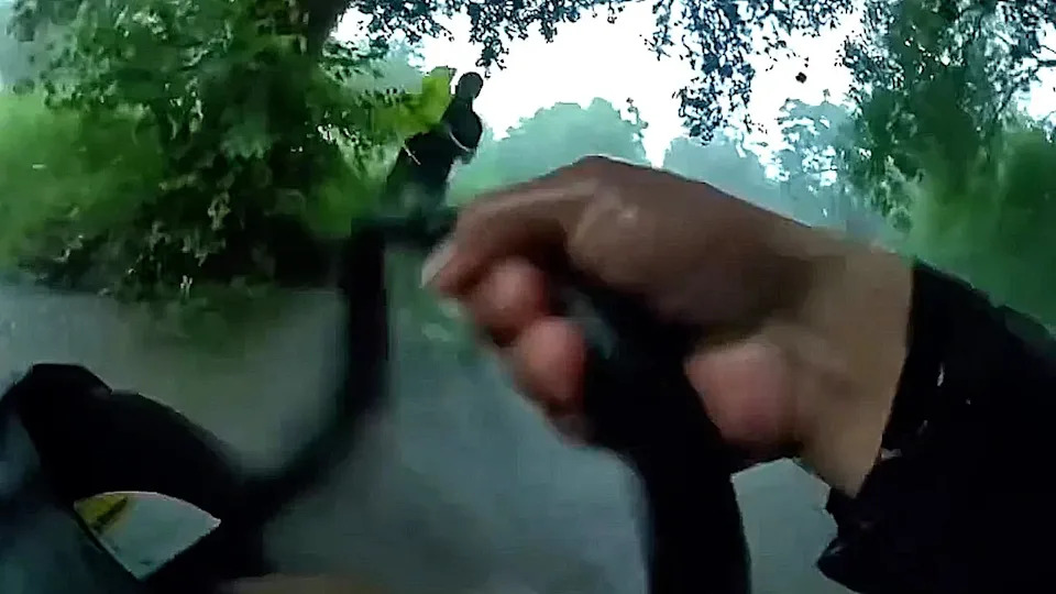 Body-Cam Shows Dramatic Rescue Of Baby From Car Swept By Floodwaters In Beeville, Texas