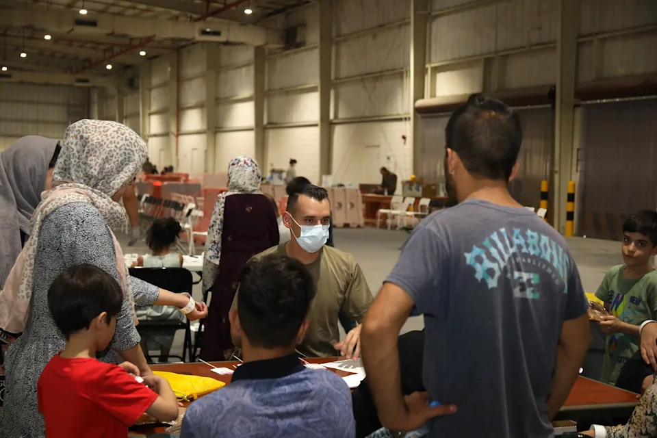 Afghan Teen and 1,100 Refugees Stranded at U.S. Base in Doha Amid Paused Resettlement