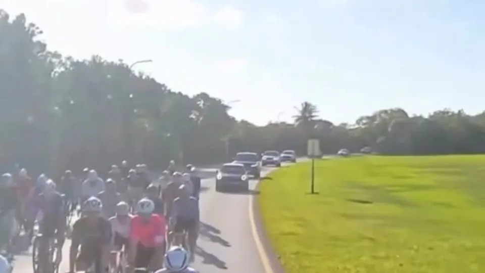 Driver Mounts Grass Shoulder to Pass Peloton in Key Biscayne — Viral Video Sparks Road-Sharing Debate