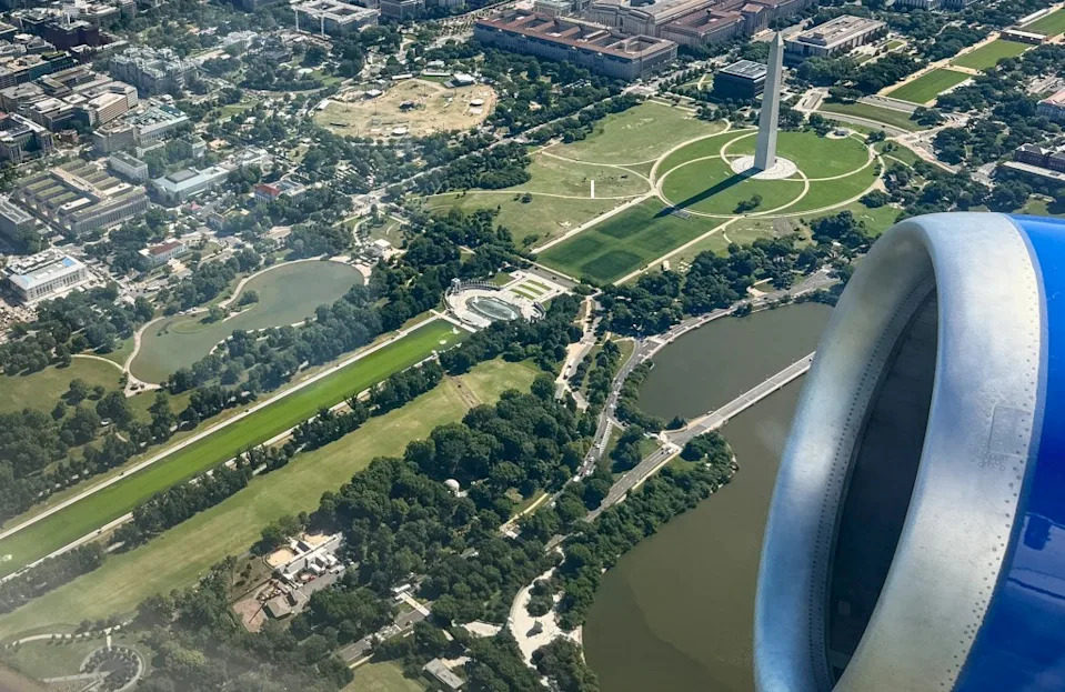 Workers Pour Hydrogen Peroxide Into Lincoln Memorial Reflecting Pool After Rapid Algae Bloom Turns Water Green