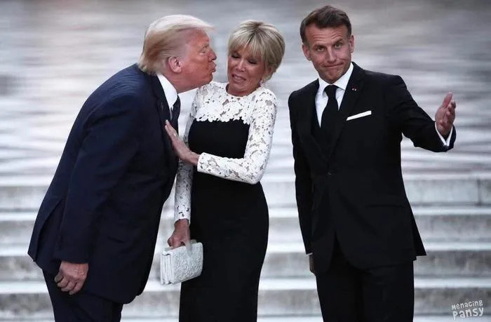 Fact Check: Viral Photo Of Brigitte Macron Pulling Away From Trump In Versailles Is Fake