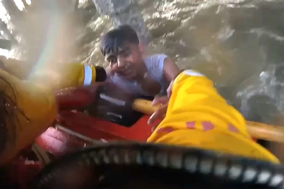 Helmet-Cam Footage Shows RNLI Lifeboat Rescue Two Boys Trapped Under Blackpool Pier During Surging Tide