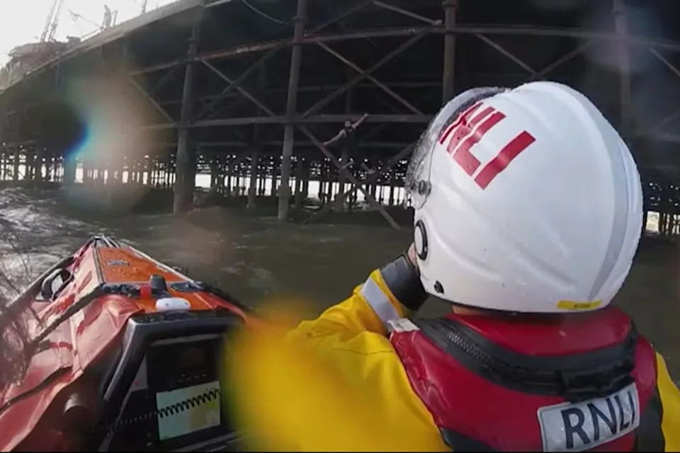 Helmet-Cam Footage Shows RNLI Lifeboat Rescue Two Boys Trapped Under Blackpool Pier During Surging Tide