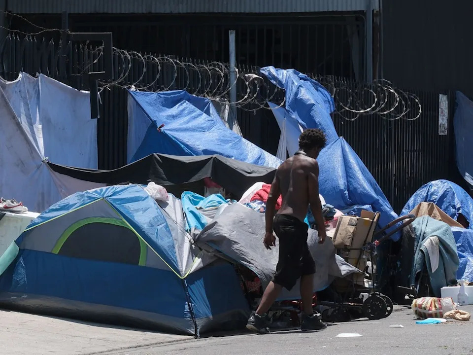 LA Cannabis Company Accused of Turning Skid Row Tents Into Walking Billboards