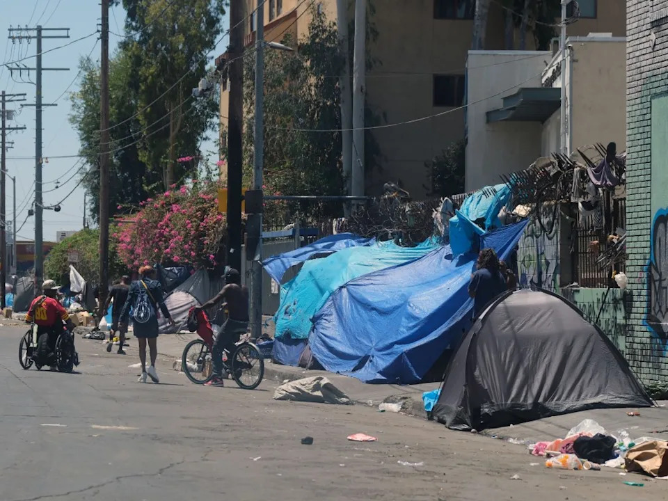 LA Cannabis Company Accused of Turning Skid Row Tents Into Walking Billboards