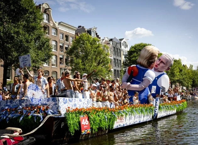 Trump–Putin Inflatable 'Kiss' Steals Spotlight at Amsterdam WorldPride Canal Parade