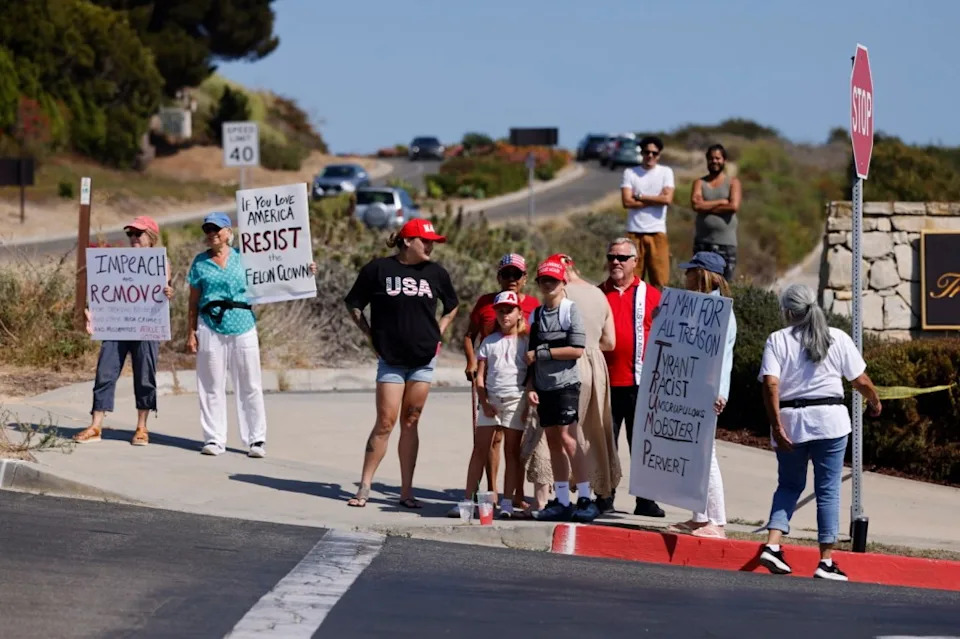 Mother Urges Son To Flip Off MAGA Supporters, Shouts Graphic Accusations Ahead Of Trump’s LA Visit