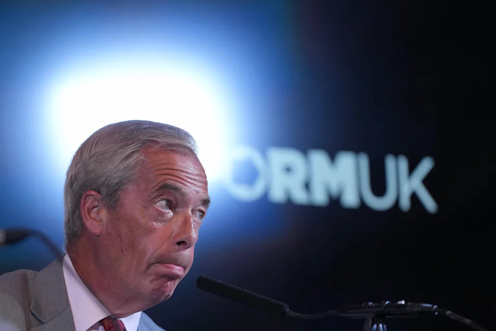 Nigel Farage Faces Scrutiny — And a Dustbin-Wearing Challenger — in Clacton By-Election