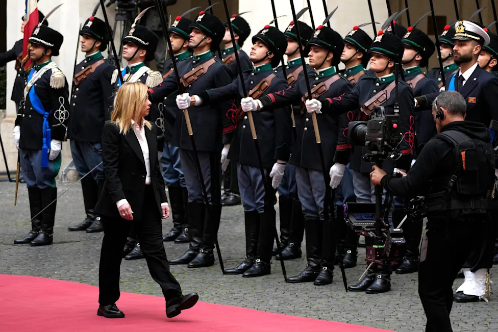 From Black Boots to Pastel Suits: How Giorgia Meloni's Wardrobe Mirrors Her Political Evolution