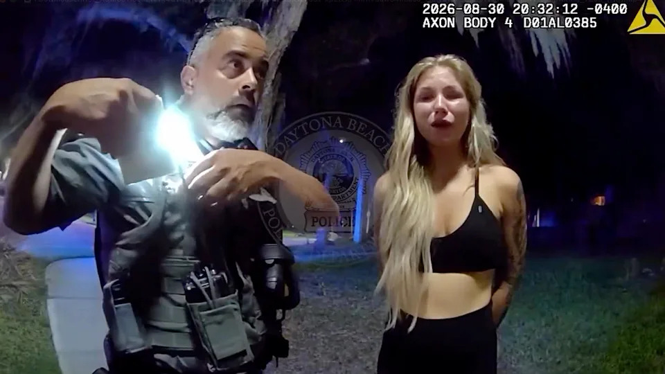 Daytona Beach Bodycam Shows Woman Downplay SUV Plow Into Parked Car, Pleads With Officers