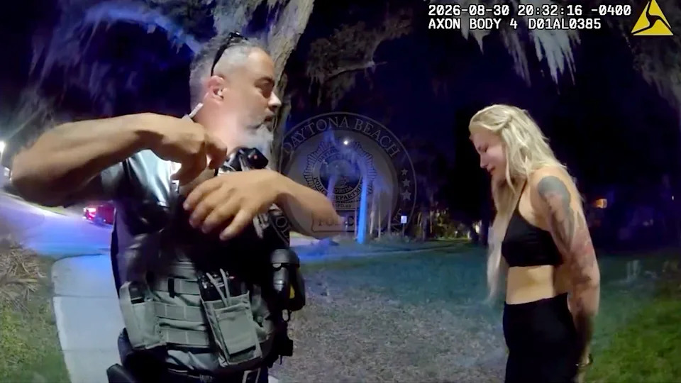 Daytona Beach Bodycam Shows Woman Downplay SUV Plow Into Parked Car, Pleads With Officers