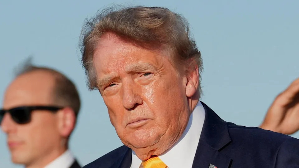 Trump’s Windy ‘Bad Hair Day’ Goes Viral as Critics and Biographer Weigh In