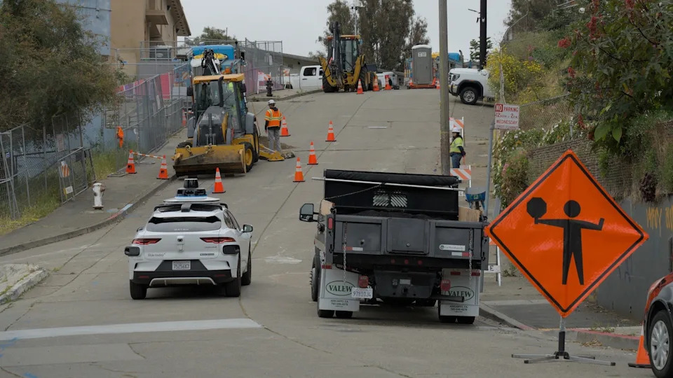 When Driverless Cars Break the Law: Who’s Responsible?