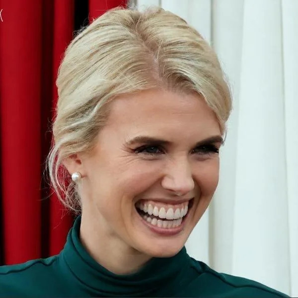 Fact Check: Viral Photo Of Natalie Harp’s Exaggerated, Toothy Grin Is AI-Altered