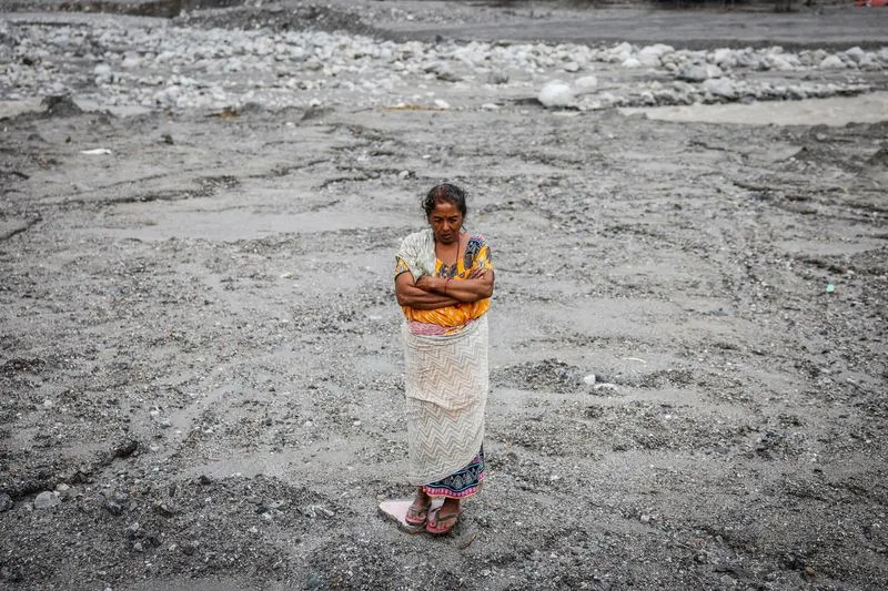 Betrawati Buried: Survivors Return to a Grey Plain After Devastating Glacial Flood