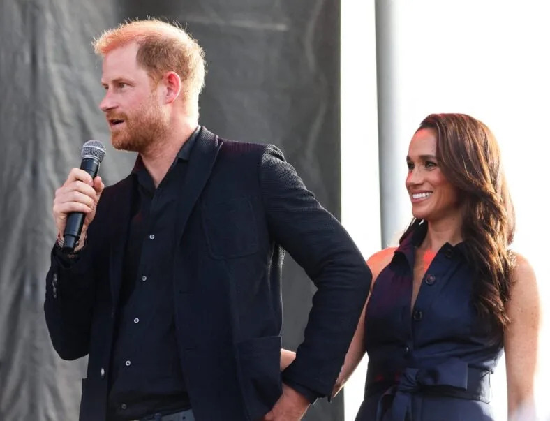 Did Meghan’s Cotswolds Video Put the Sussexes At Risk — Or Make A Point? Critics Call It A ‘Twisted Stunt’