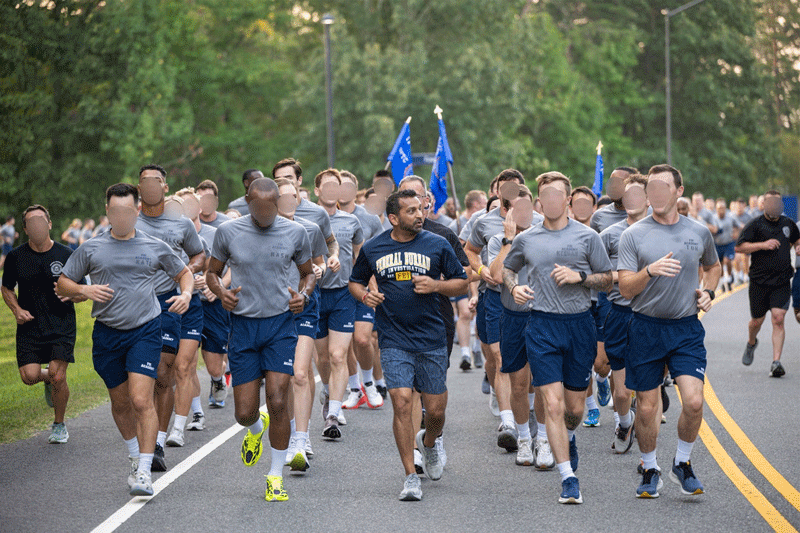Fact Check: Photo Of Kash Patel With FBI Trainees Was Digitally Altered To Shrink His Height