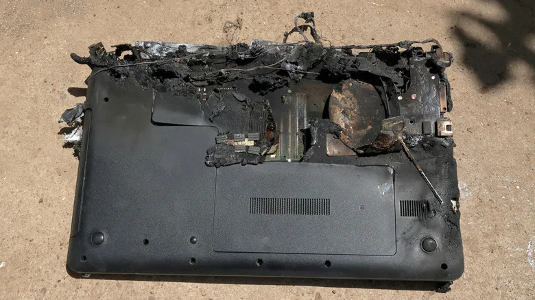 Laptop Fire on American Airlines Flight Prompts Safety Review, Possible Device Bans and Insurance Hikes