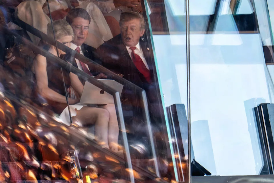 Natalie Harp Draws Attention as Trump Leans Over Her Laptop at Neyland Stadium