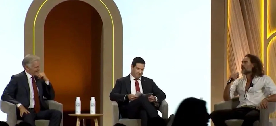 Russell Brand and Dr. Oz Trade Jokes About Hugging Trump Cabinet Member at MAHA Summit as Brand Faces Multiple Sexual-Offence Charges
